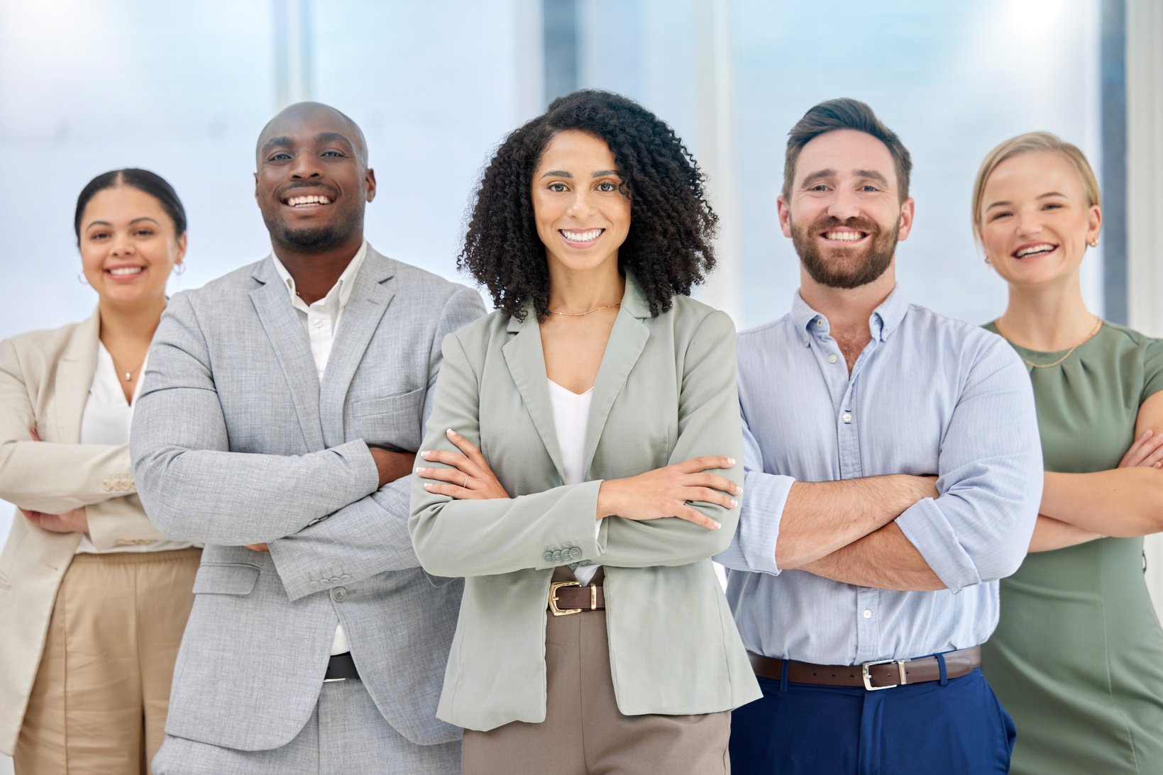 Teamwork, portrait and diversity of office team happy about collaboration and management. We are hiring, about us and our vision working group standing proud with a smile and corporate success